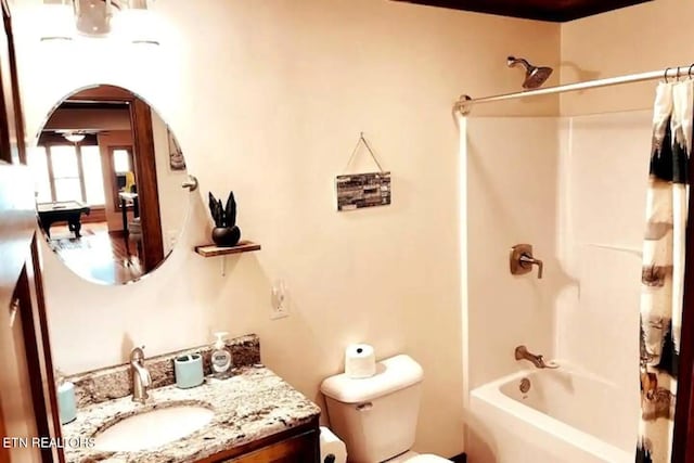 107 Dream Way, Sevierville, TN 37876 - full bathroom featuring toilet, shower / tub combo with curtain, and vanity with extensive cabinet space