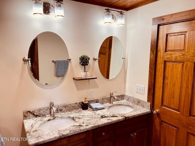 107 Dream Way, Sevierville, TN 37876 - bathroom featuring wood ceiling and dual bowl vanity