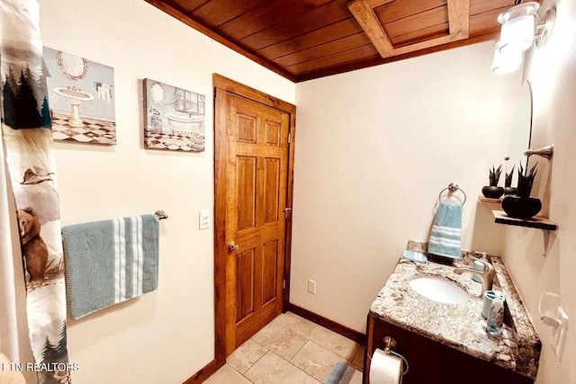 107 Dream Way, Sevierville, TN 37876 - bathroom featuring tile flooring, wood ceiling, and vanity with extensive cabinet space
