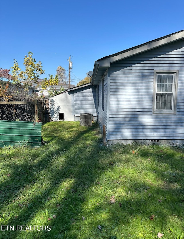 252 Chasteen Dr, Middlesboro, KY 40965 - view of property exterior with central air condition unit and a yard