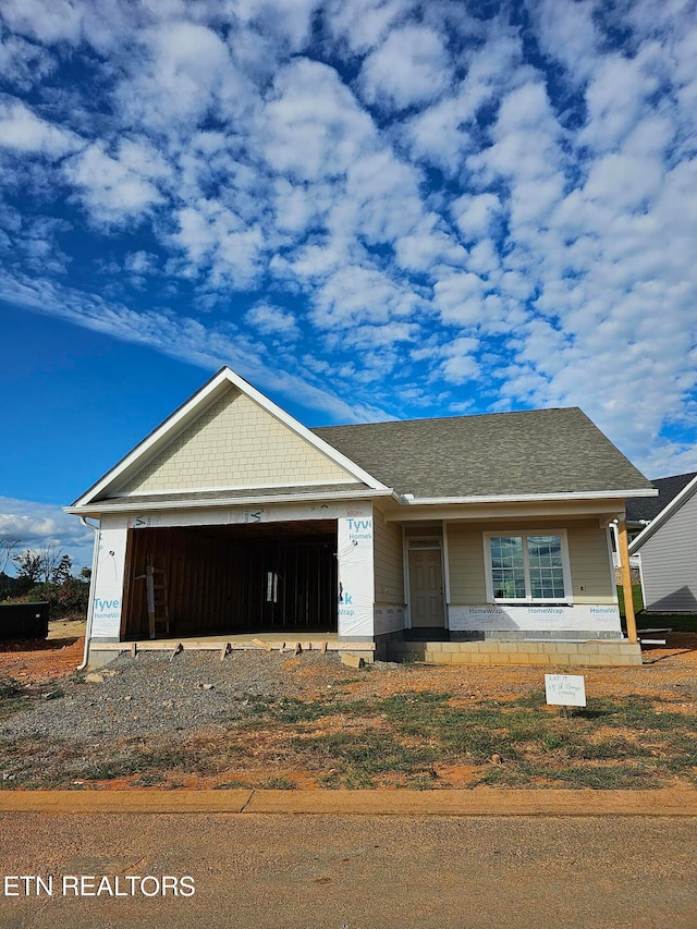 view of front of property featuring a garage