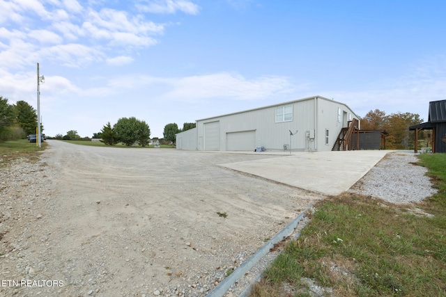 view of outdoor structure with a garage