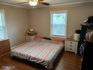 bedroom featuring dark wood-type flooring and ceiling fan