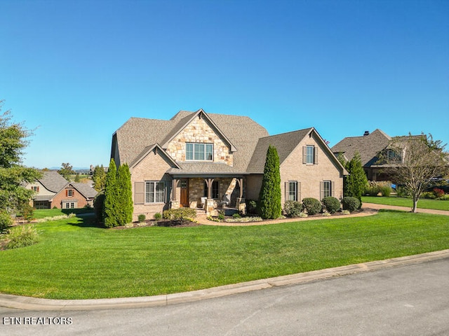 view of front of house featuring a front lawn