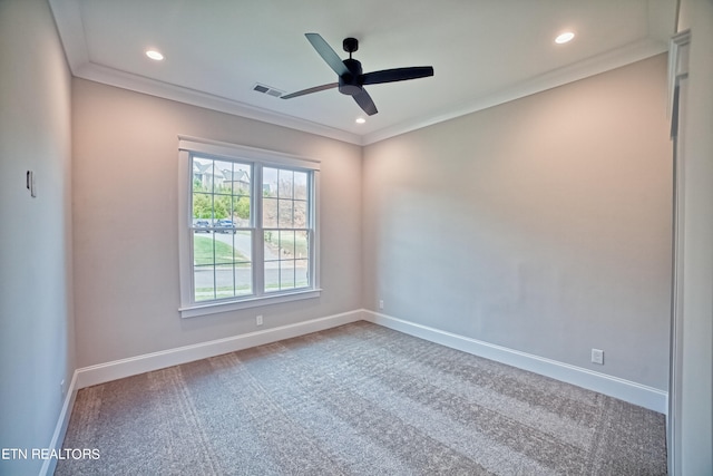 carpeted spare room with recessed lighting, baseboards, visible vents, and ornamental molding