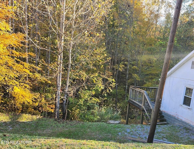 view of yard with a deck