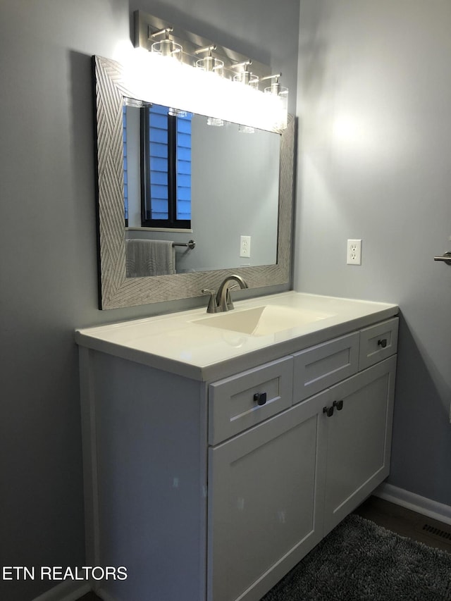 bathroom featuring vanity