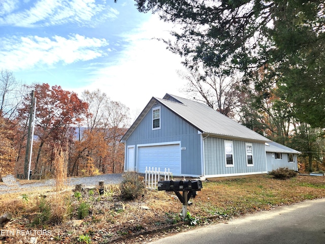 view of home's exterior with a garage