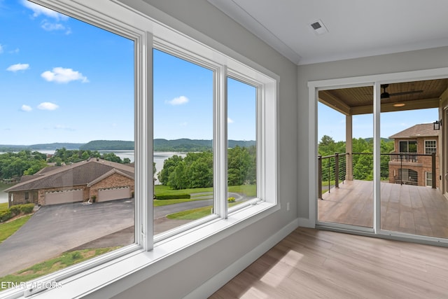 unfurnished sunroom with plenty of natural light