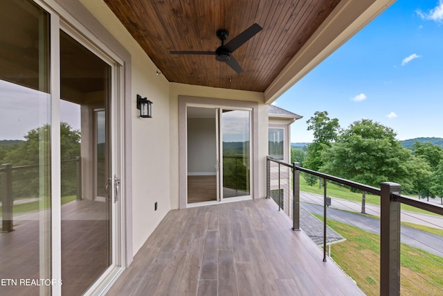 balcony featuring ceiling fan