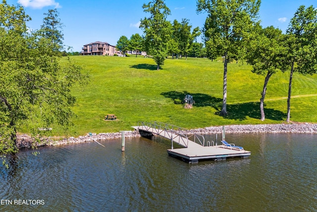 dock area featuring a water view