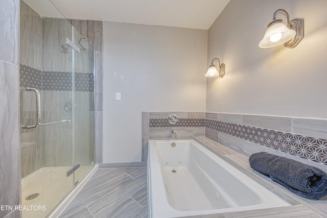 bathroom with plus walk in shower and tile floors