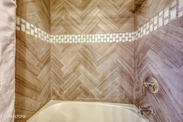 bathroom featuring parquet flooring