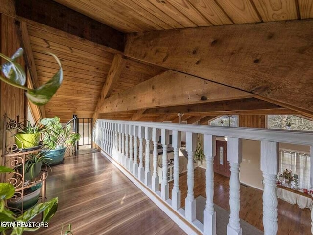 hall with dark hardwood / wood-style floors, wood ceiling, and vaulted ceiling with beams