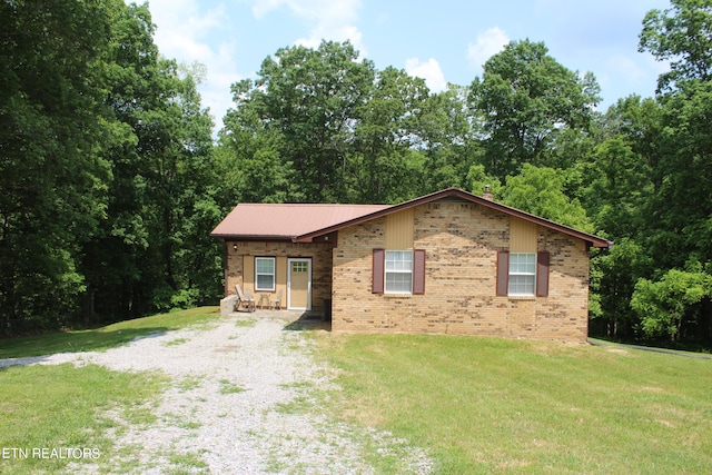 view of front of property with a front lawn