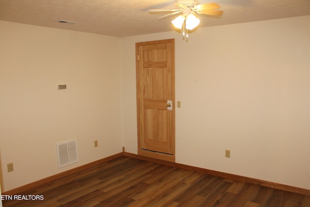 spare room featuring ceiling fan and wood-type flooring