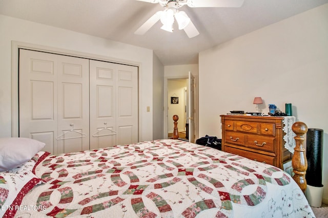 bedroom featuring ceiling fan and a closet