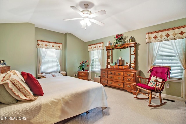 carpeted bedroom featuring ceiling fan and lofted ceiling