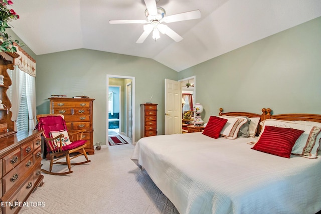 carpeted bedroom with lofted ceiling and ceiling fan