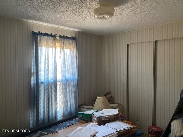 bedroom with a textured ceiling