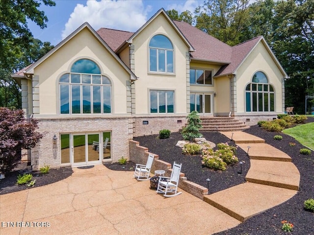 view of front of home featuring a patio area