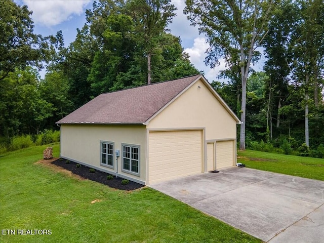 garage with a yard