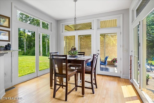 sunroom / solarium with a healthy amount of sunlight