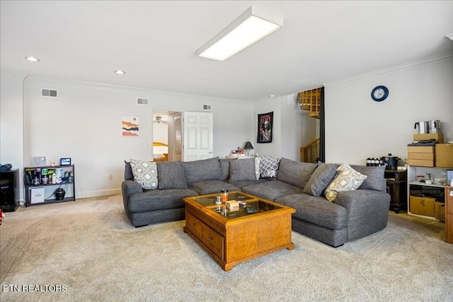 living room featuring crown molding and light colored carpet