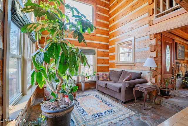 living room featuring wooden walls