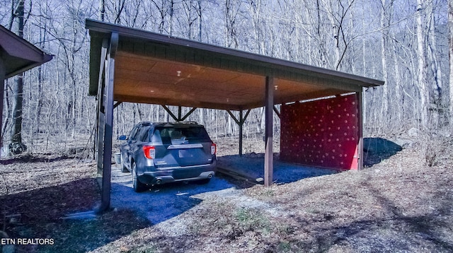 view of car parking featuring a carport