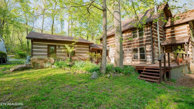 view of yard featuring a deck