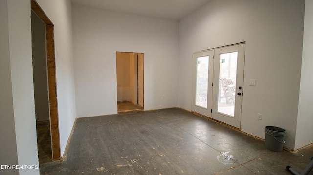 foyer entrance with a high ceiling