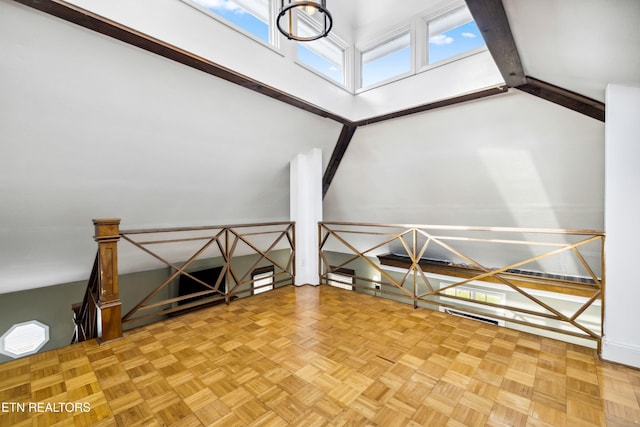 bonus room featuring a high ceiling