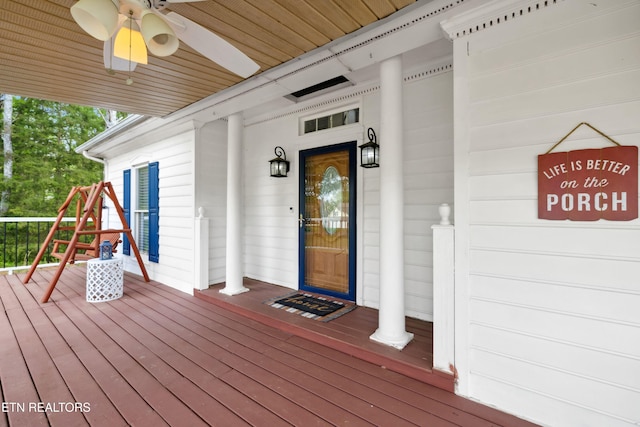 wooden terrace featuring a ceiling fan and covered porch