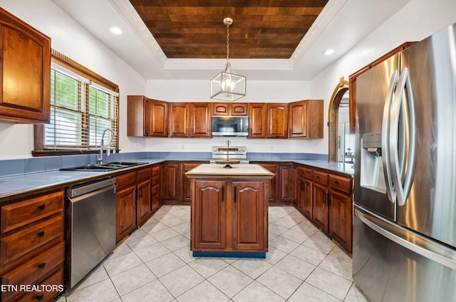 kitchen featuring a center island, a sink, appliances with stainless steel finishes, wood ceiling, and a raised ceiling