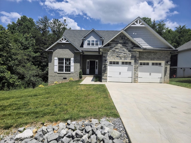 craftsman inspired home with a garage and a front yard