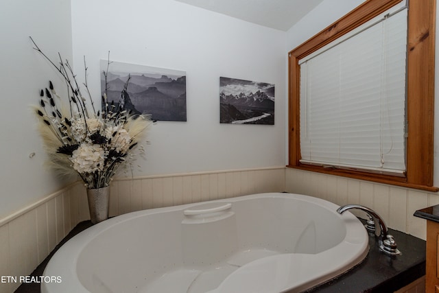 bathroom featuring a tub