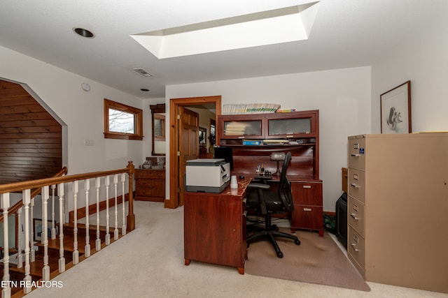 office area featuring light colored carpet