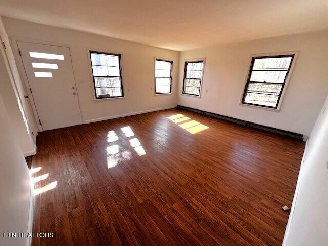 entrance foyer with dark hardwood / wood-style flooring