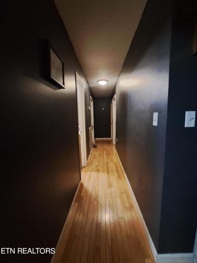 hall featuring light hardwood / wood-style flooring