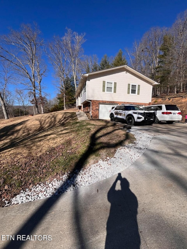 view of home's exterior with a garage