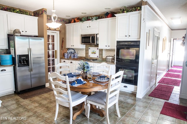 352 Rutherford Dr, New Tazewell, TN 37825 - kitchen with white cabinets, backsplash, tile flooring, and stainless steel appliances