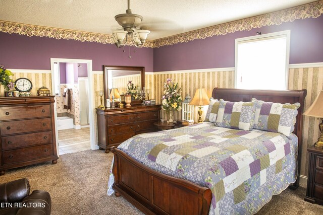 352 Rutherford Dr, New Tazewell, TN 37825 - bedroom with ceiling fan, a textured ceiling, carpet floors, and ensuite bath