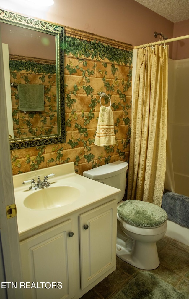 352 Rutherford Dr, New Tazewell, TN 37825 - full bathroom with toilet, shower / bath combo with shower curtain, tile floors, a textured ceiling, and vanity