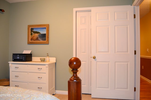 bedroom with light hardwood / wood-style floors