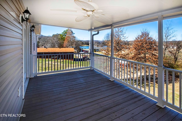 wooden terrace with ceiling fan