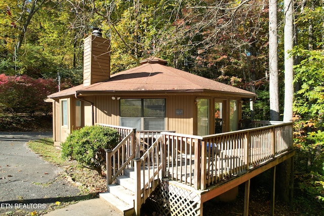 view of front of property featuring a wooden deck