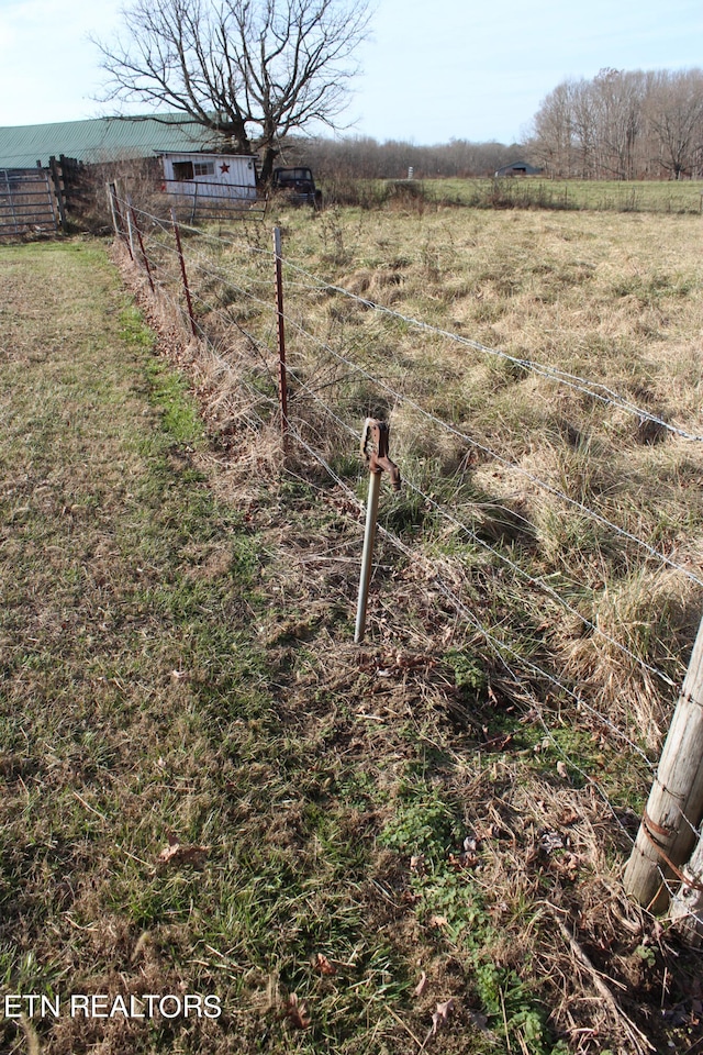 view of yard featuring a rural view