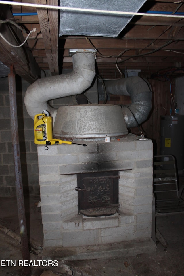 utility room with electric water heater