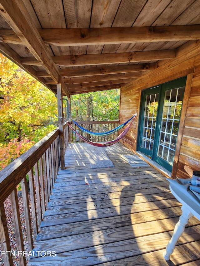 wooden terrace featuring french doors